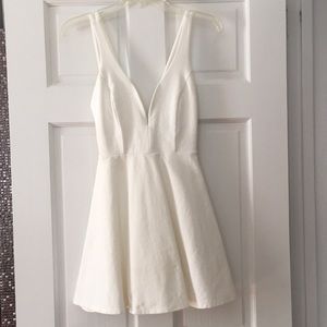 Beautiful white fit-and-Flare v-cut Lulus dress